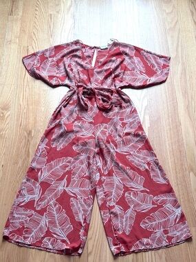 Sienna Sky size medium Orange/Red and Cream Floral Wrap jump suit